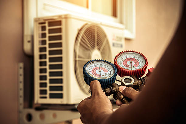 Professional Air Conditioning Service technician working in Republic, WA
